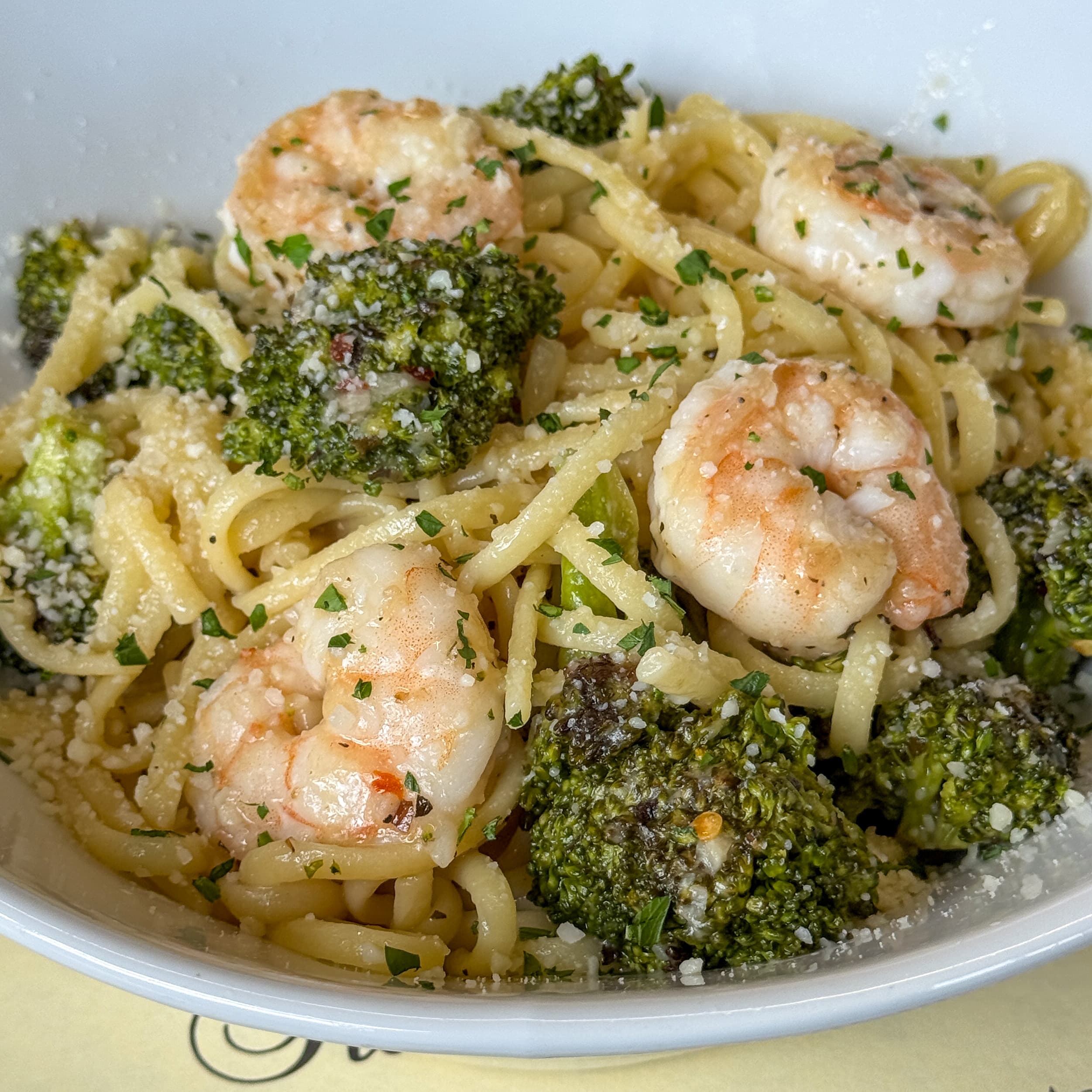 Shrimp in white wine sauce over pasta